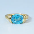 East-West Blue Oval Gemstone Solitaire Ring