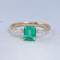 Emerald Gemstone And Kite Cut Three Stone Engagement Ring