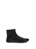 The Row Shearling-Lined Leather Ankle Boot — Black