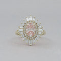 Fancy Vivid Pink Oval Cut Double Halo Sunbrust Ring