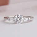 Round and Tapered Baguette Cut Three Stone Engagement Ring