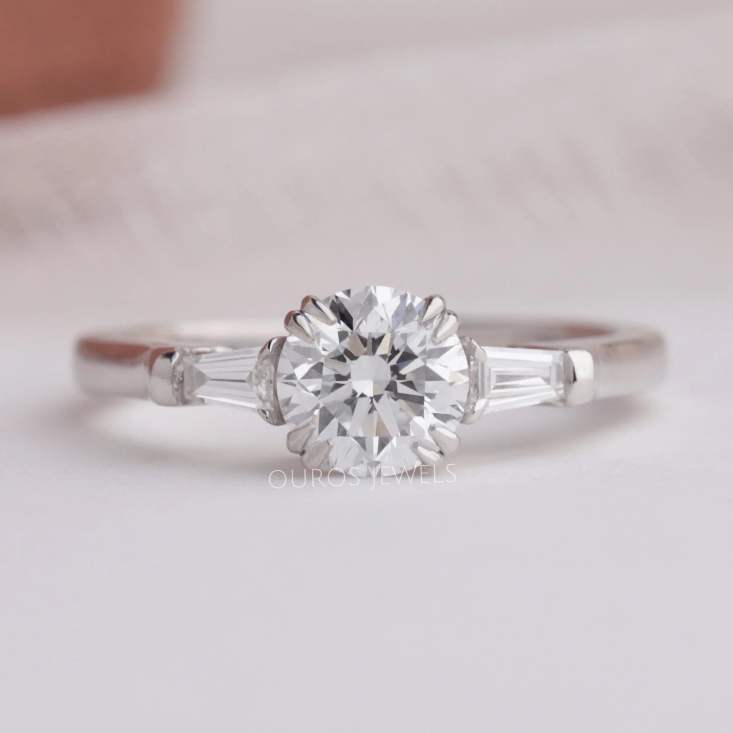 Round and Tapered Baguette Cut Three Stone Engagement Ring