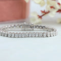 Round Cut Half Bezel Set Tennis Bracelet