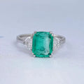 Green Cushion And Half Moon Trio Engagement Ring