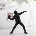 ArtZ® Man Throwing Flowers Sculpture - Black