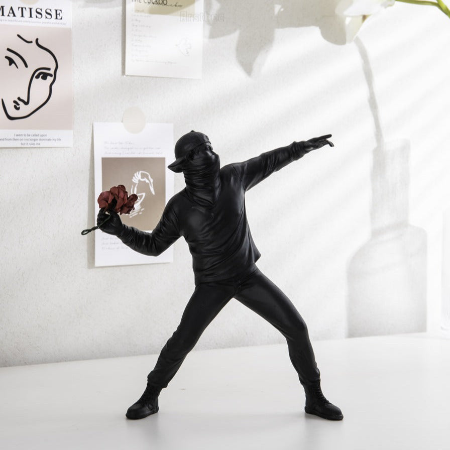 ArtZ® Man Throwing Flowers Sculpture - Black