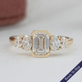 Half Bezel Emerald And Oval Five Stone Engagement Ring