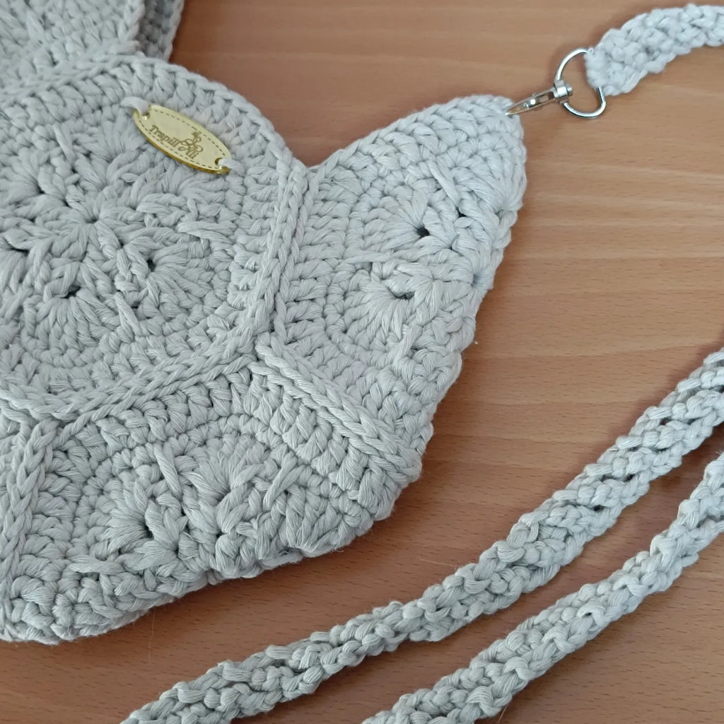 Bolsito flor africana