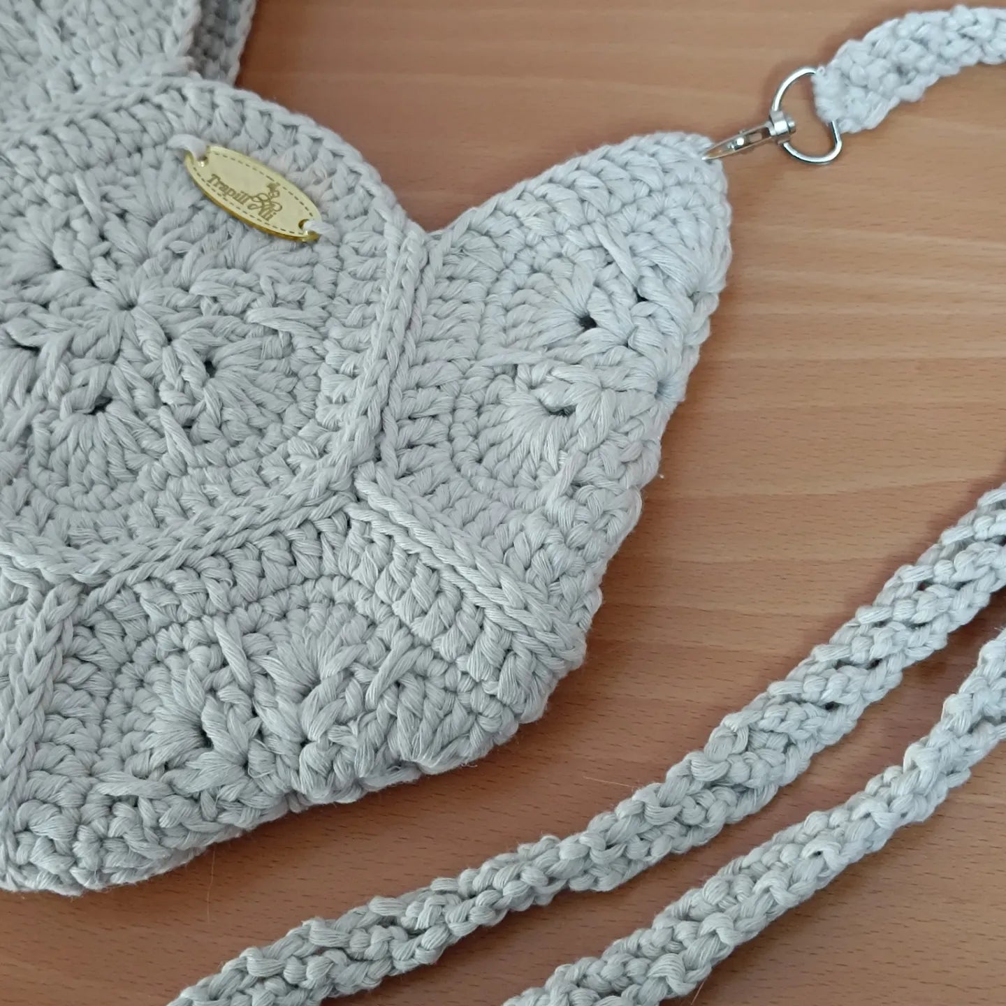 Bolsito flor africana