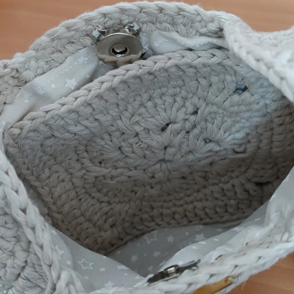 Bolsito flor africana