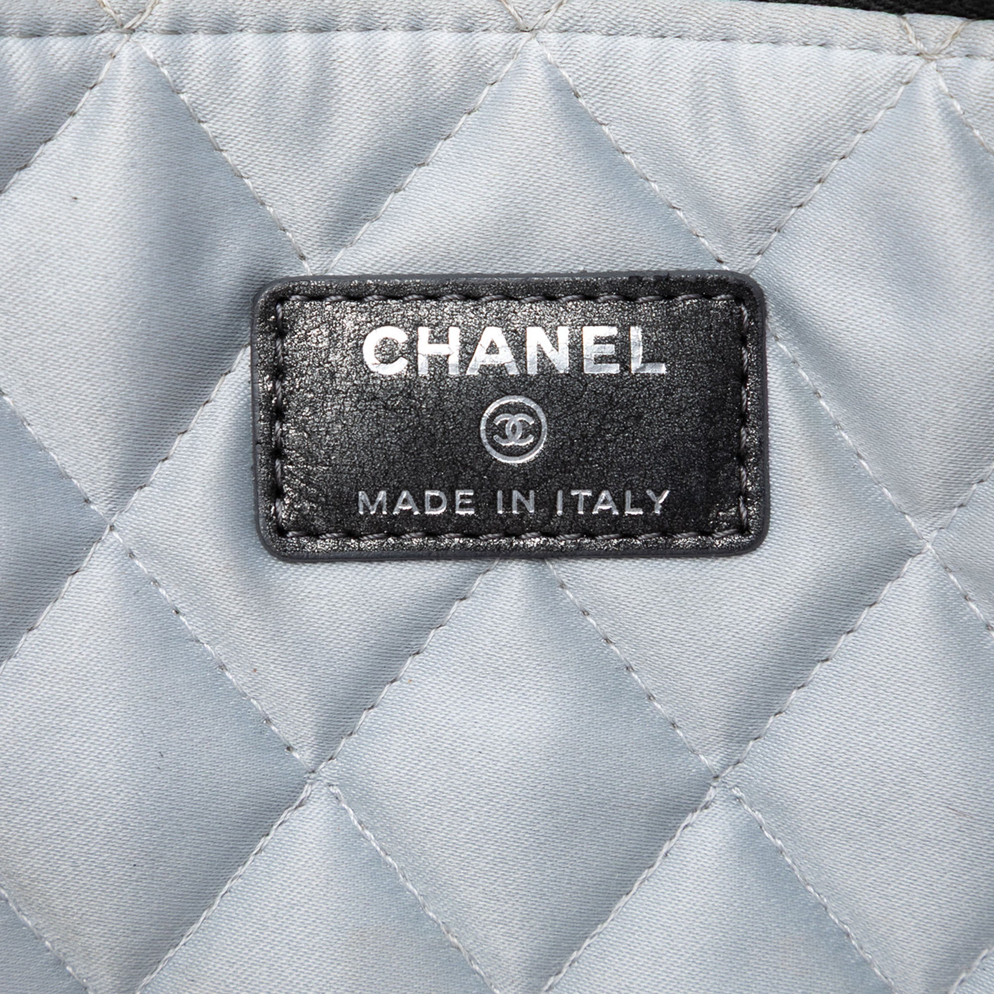 Medium Quilted Iridescent Calfskin Flower CC O Case Clutch