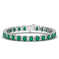 Alternating Emerald Cut Emerald and Baguette Diamond Bangle
