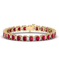 Alternating Emerald Cut Ruby and Baguette Diamond Bangle