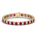 Alternating Oval Ruby and Baguette Diamond Bangle