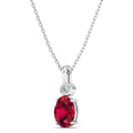Oval Ruby and Bezel Accent Diamond Pendant