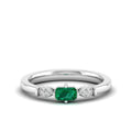 East-West Emerald and Filligree Diamond Ring