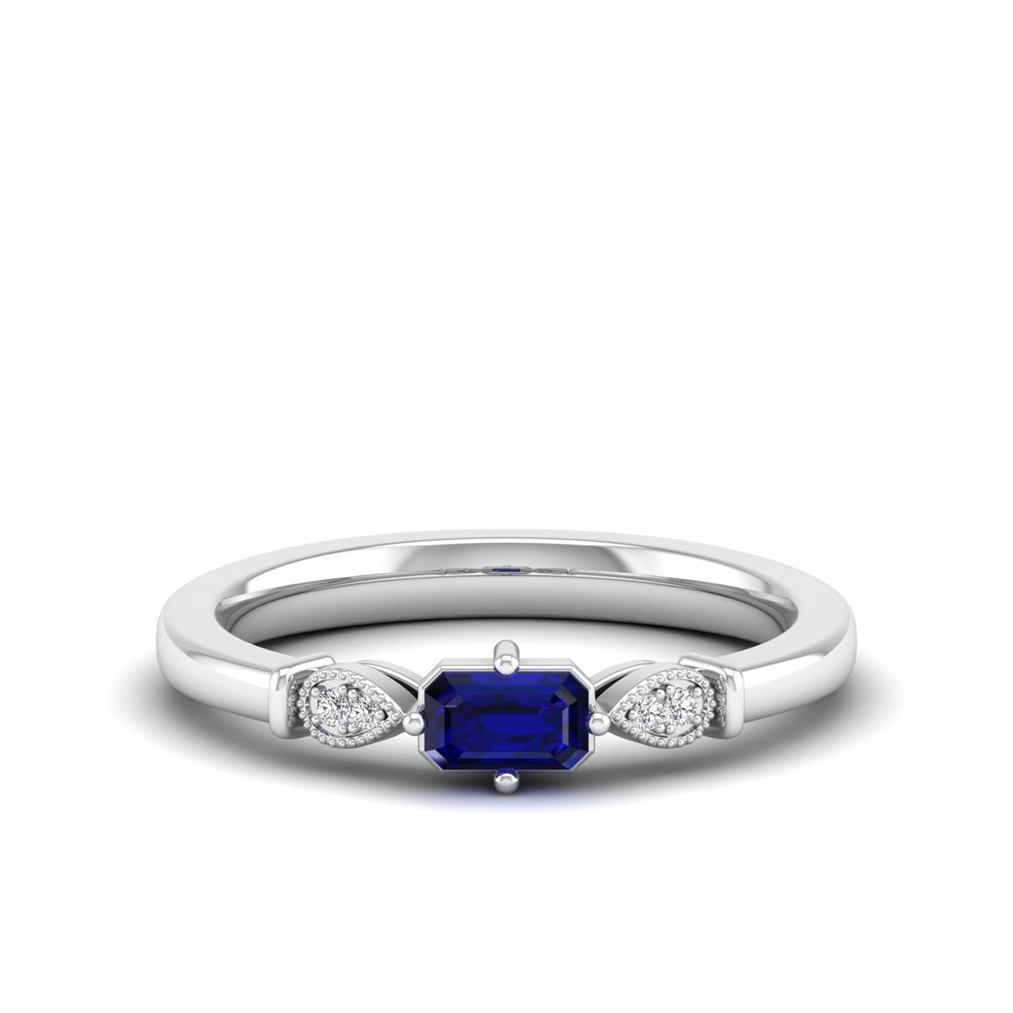 East-West Sapphire and Filligree Diamond Ring