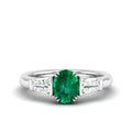 Emerald and Tapered Baguette Diamond Ring