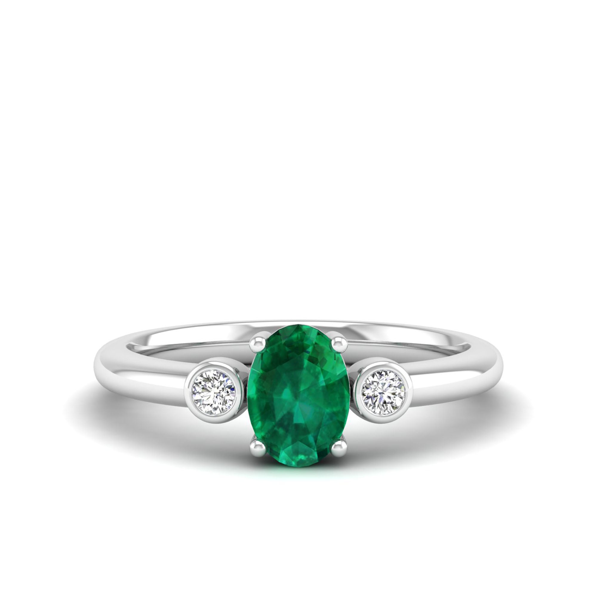 Prong Oval Emerald and Bezel Diamond Ring
