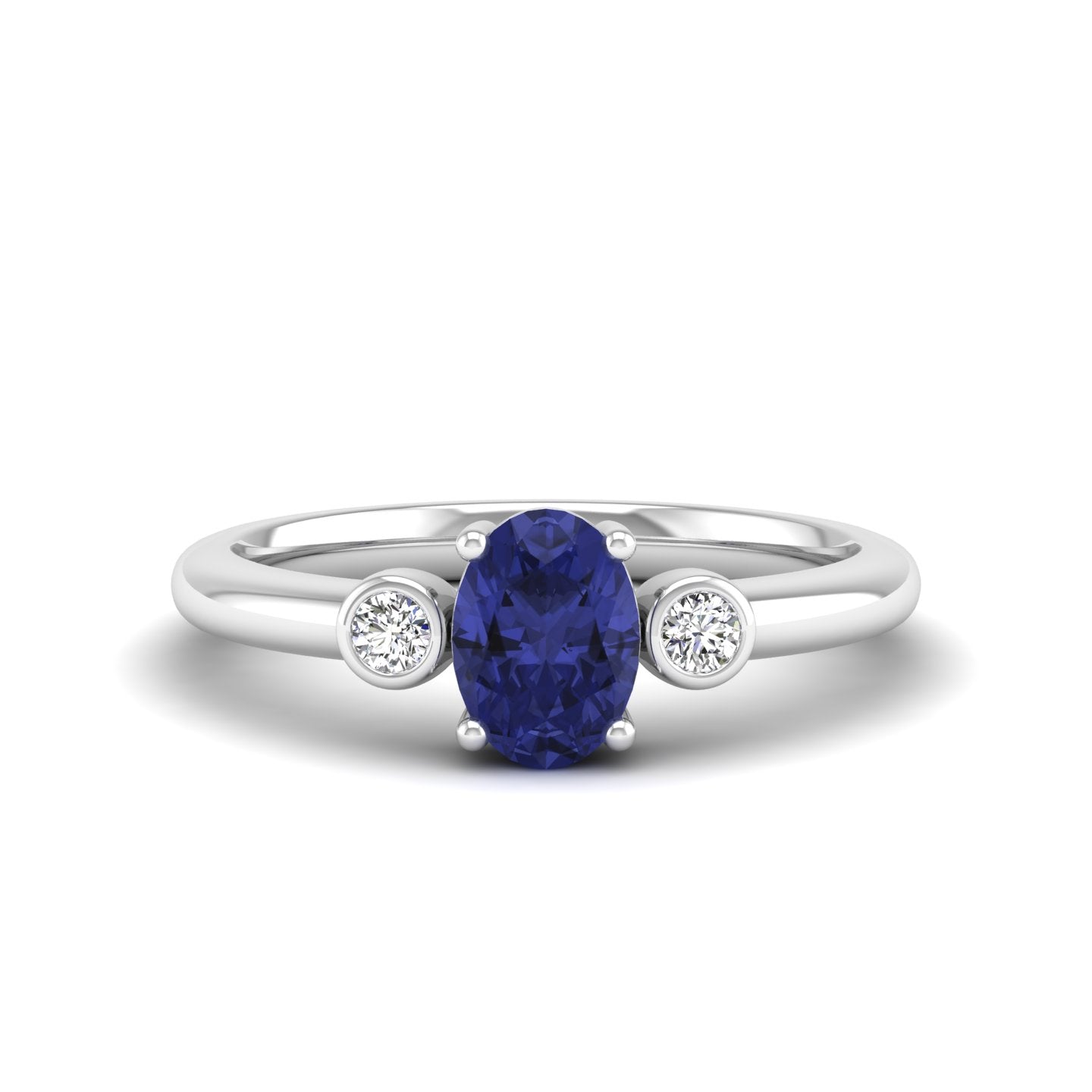 Prong Oval Tanzanite and Bezel Diamond Ring