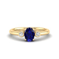 Prong Oval Sapphire and Bezel Diamond Ring