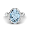 Halo Oval Aquamarine and Diamond Ring