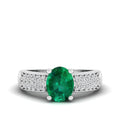 Prong Set Oval Emerald and Diamond Ring