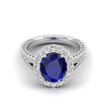 Oval Sapphire Shared Prong Halo Diamond Ring