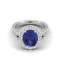Oval Tanzanite Shared Prong Halo Diamond Ring