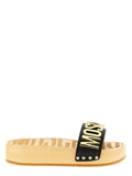 Moschino Logo-Embellished Clog Sandal — Beige