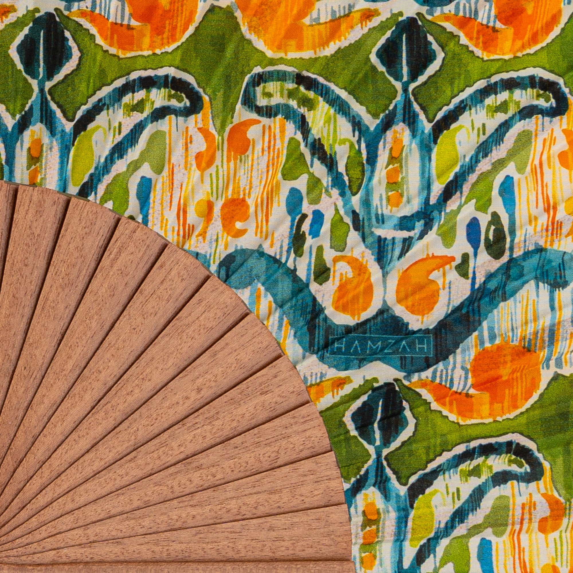 Handcrafted Silk Fan with Vibrant Ikat Pattern - Made in Spain