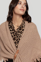 PONCHO  TRENZADO