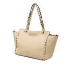 Small Grained Calfskin Rockstud Trapeze Satchel