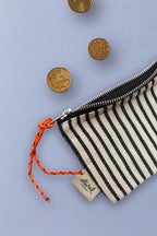 Monedero loneta estribera blanco y negro