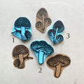 Hand carved rubber stamps of mushrooms