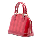 Monogram Vernis Rayures Alma BB