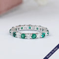 Emerald Gemstone And Round Diamond Wedding Band