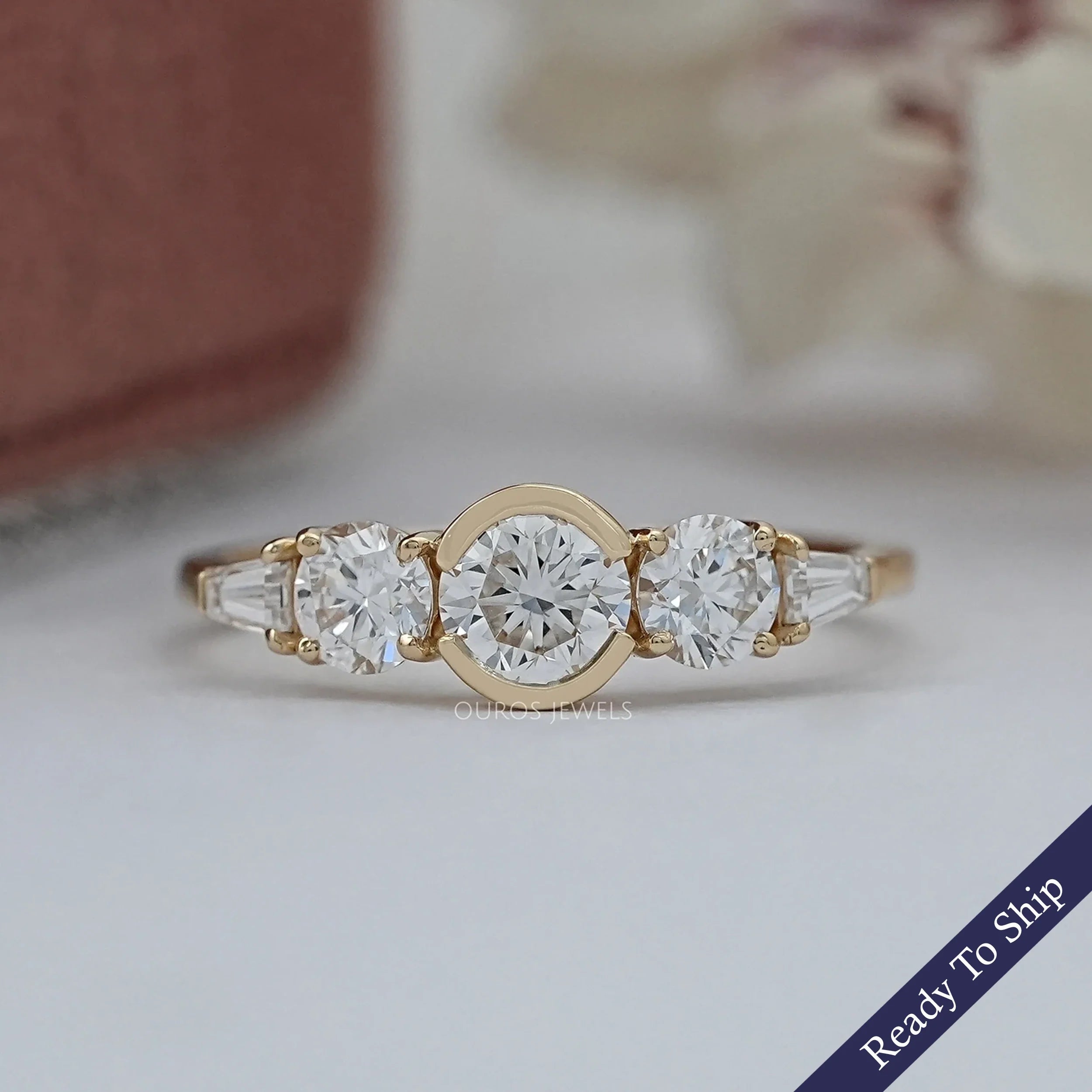 Five Stone Round And Tapered Baguette Cut Engagement Ring