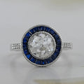 OEC Round Diamond Surround Sapphire Baguette Halo Ring