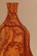 Tabla de madera de olivo irregular con mango mediana