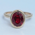 Oval Cut Ruby Lab Gemstone Bezel Set Solitaire Ring