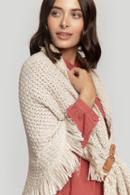 PONCHO  TRENZADO