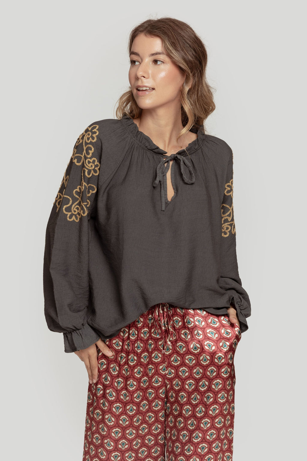 BLUSA  TIRA