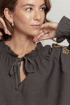 BLUSA  TIRA