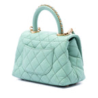 Extra Mini Quilted Caviar Coco Top Handle Bag