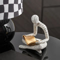 ArtZ® Amused Nordic Reading Sculpture - White