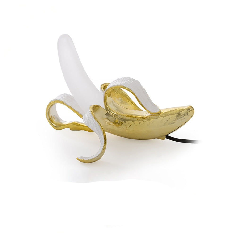 ArtZ® Banana LED Table Lamp - Electroplated Gold Sitting / US Plug