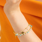 Pulsera con Cristal Azul Oscuro acabado oro 18k - Thase