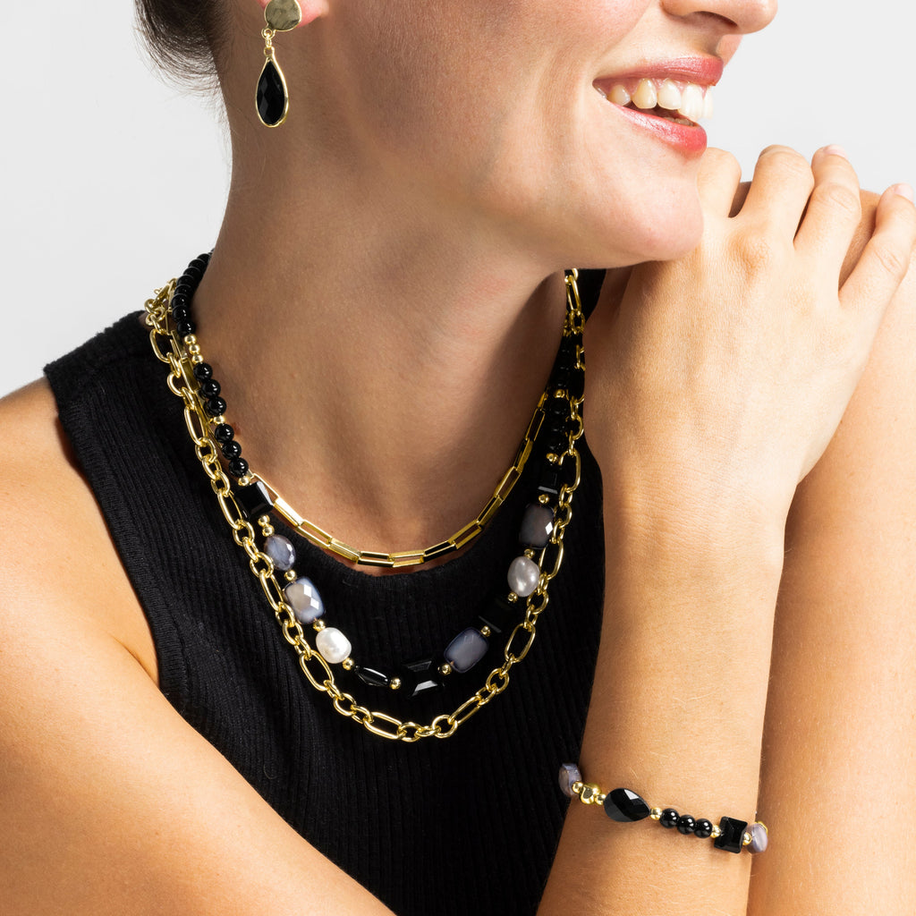 Pulsera con Resina Negra acabado oro 18k - Nyste