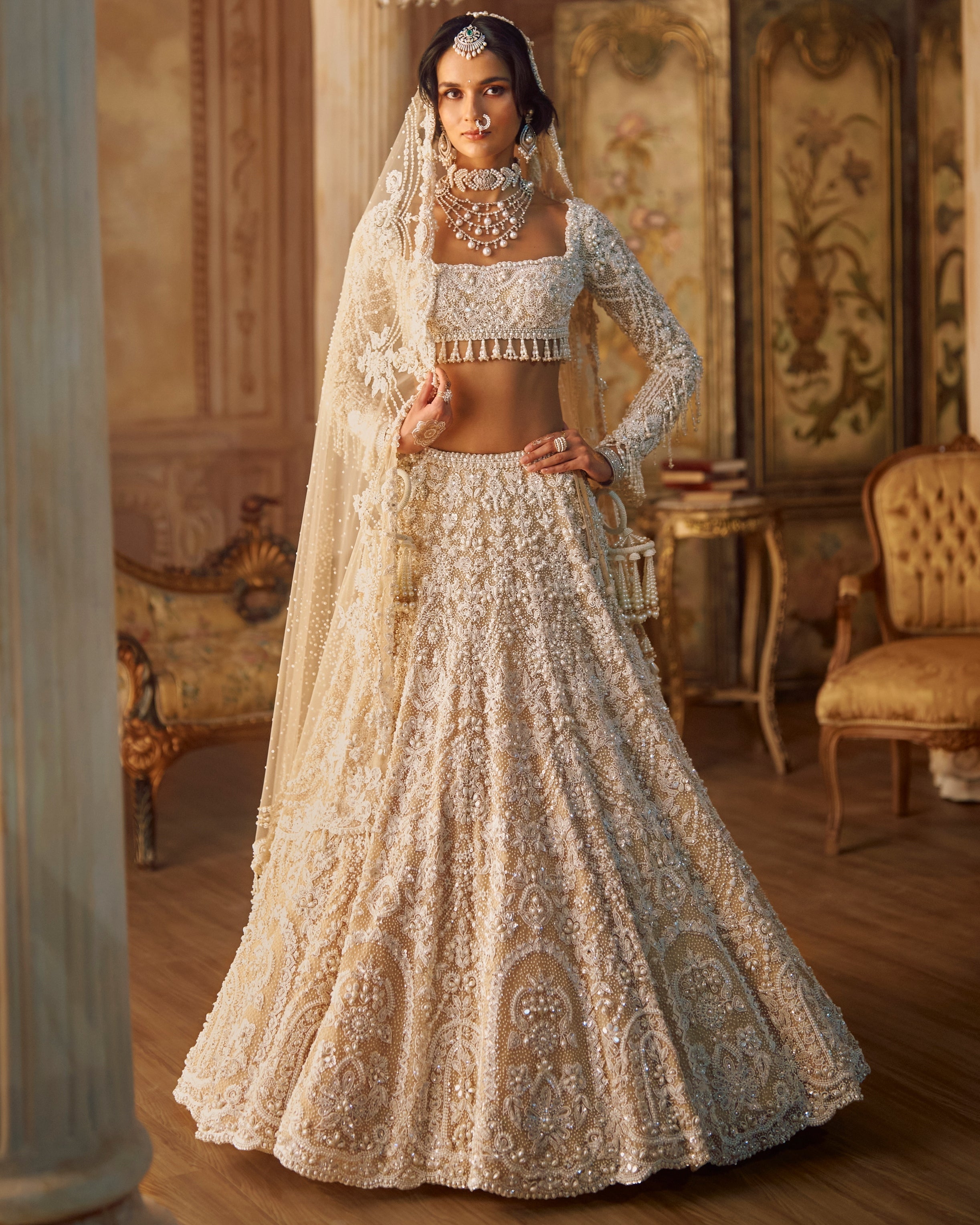 Nude Heavily Embroidered Bridal Pearl Lehenga Set By KYNAH, Luxury Indian Fashion & Bridal Wear